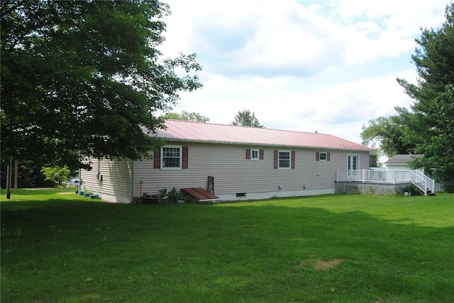516 N Tionesta Ave, Kane Boro, PA 16735 - back of house with a deck, a lawn, and a metal roof