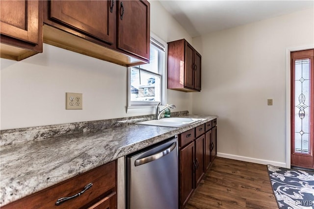 kitchen featuring sink, dark hardwood / wood-style floors, and stainless steel dishwasher