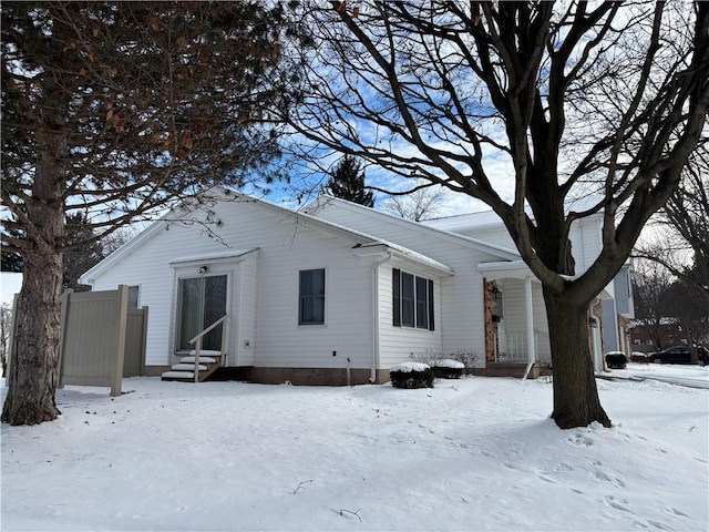 view of snow covered house