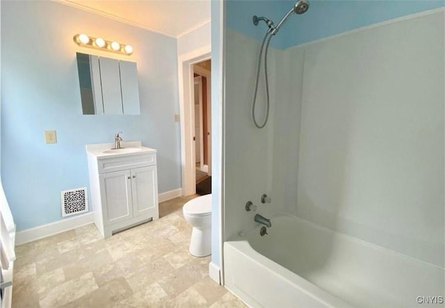 full bathroom with toilet, vanity, and shower / washtub combination