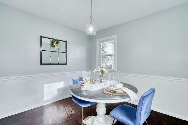 dining area with dark wood-type flooring