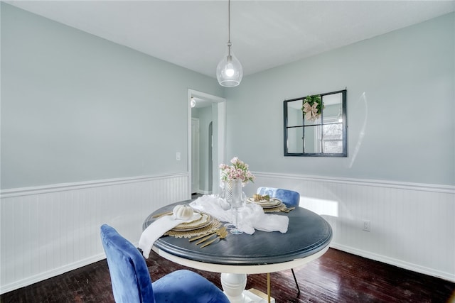 dining area featuring dark hardwood / wood-style floors