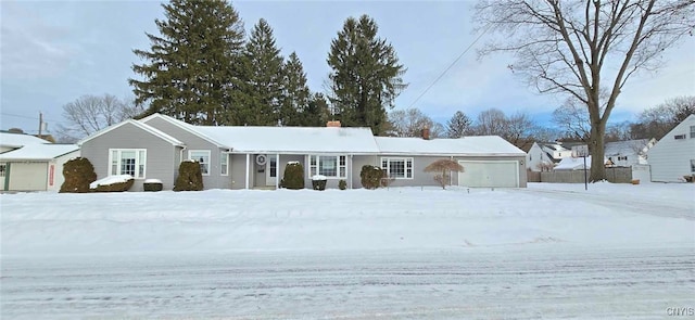 ranch-style home with a garage