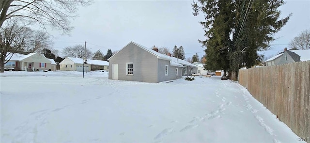 view of snow covered property