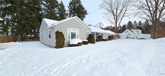 view of snow covered property