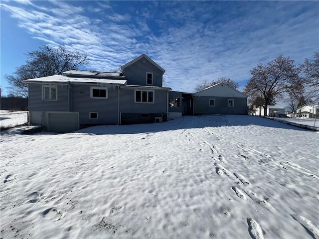 view of snow covered property