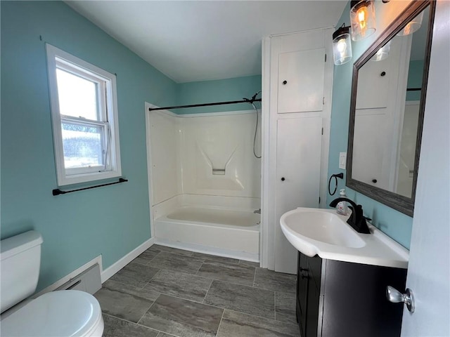 full bathroom with vanity, shower / bathtub combination, and toilet