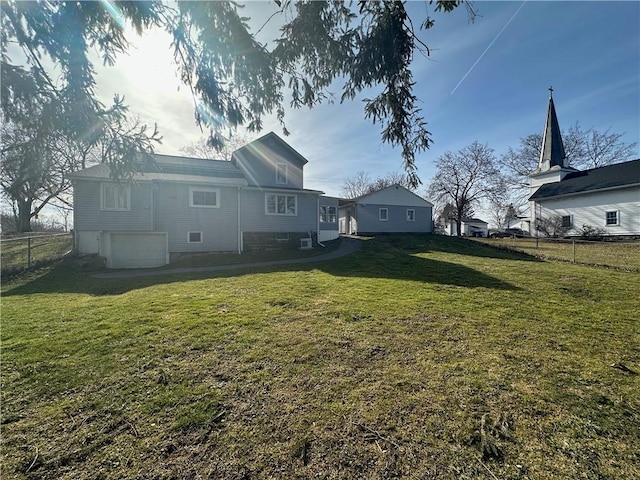 8074 State Route 90, Montezuma, NY 13040 - view of yard featuring a garage and fence