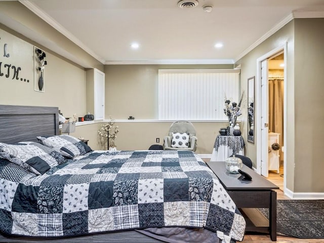 bedroom featuring crown molding and hardwood / wood-style floors