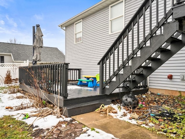 view of snow covered deck