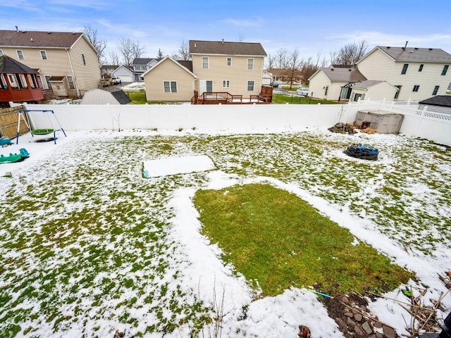 view of yard covered in snow