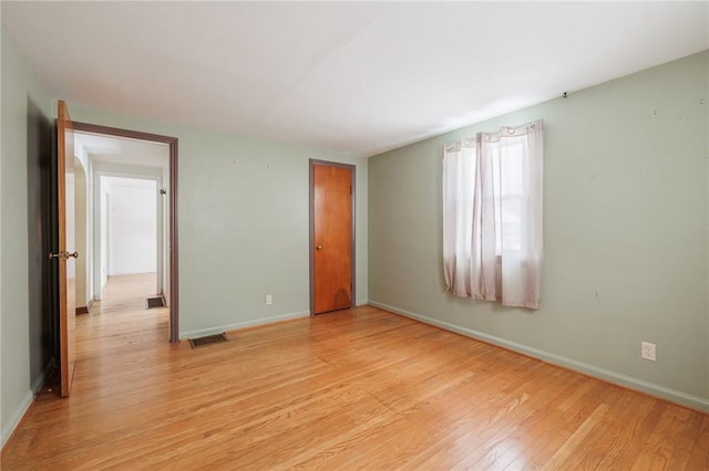 unfurnished bedroom with light hardwood / wood-style flooring