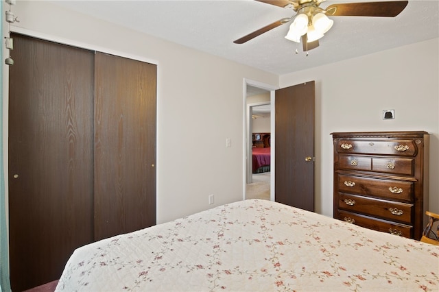 bedroom featuring a closet and ceiling fan