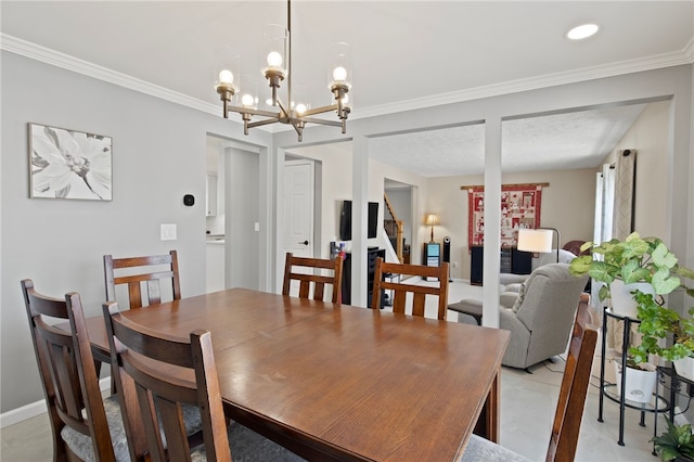 dining space with an inviting chandelier and crown molding