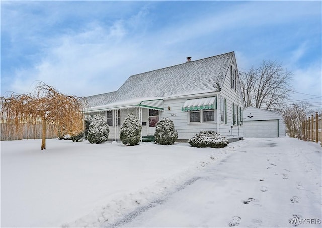 exterior space featuring an outbuilding and a garage