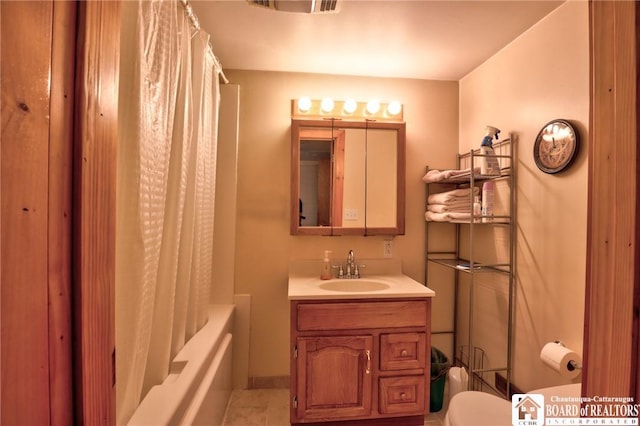 full bathroom featuring toilet, tile patterned flooring, shower / bathtub combination with curtain, and vanity