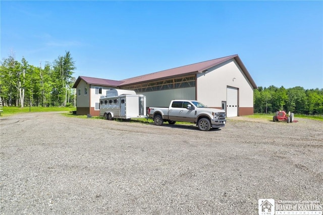 exterior space featuring an outbuilding