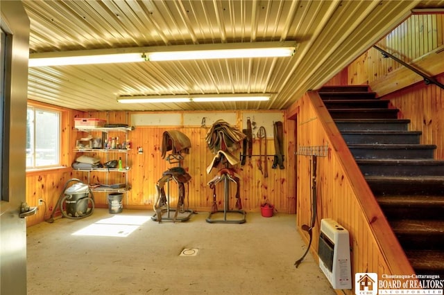 view of horse barn featuring heating unit