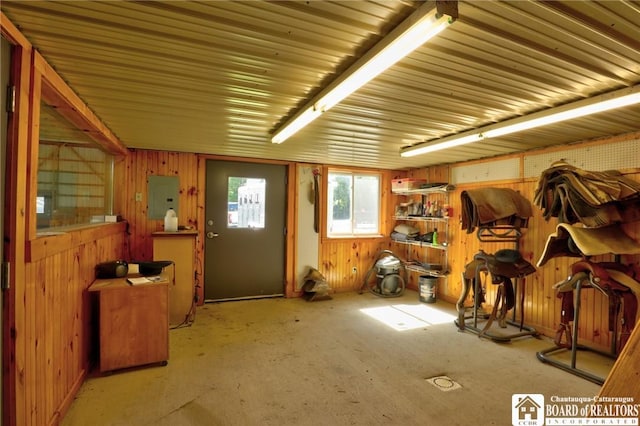 view of horse barn featuring electric panel