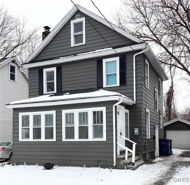 front of property featuring an outbuilding and a garage