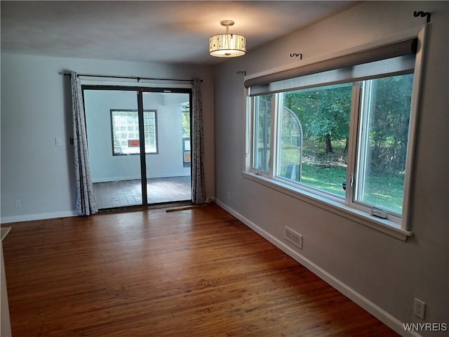 empty room featuring hardwood / wood-style floors