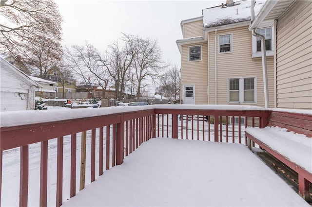 view of snow covered deck