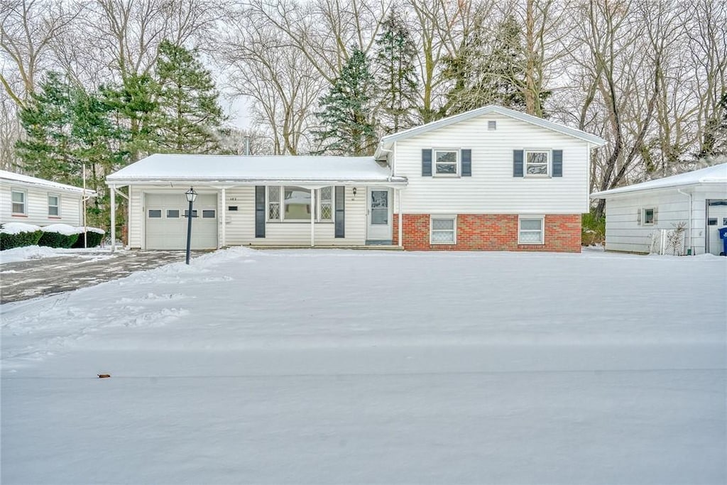 split level home featuring a garage