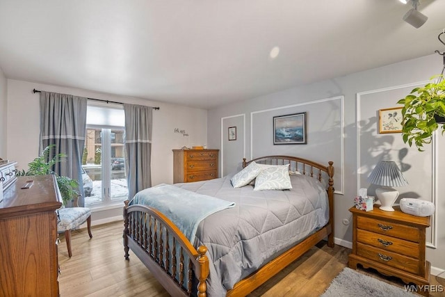 bedroom featuring light wood-type flooring