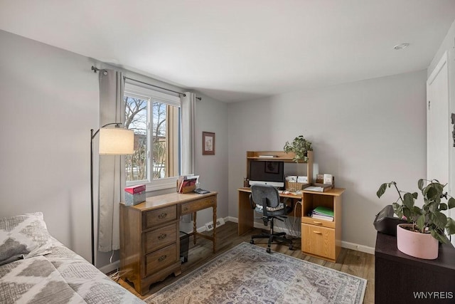 home office with dark wood-type flooring