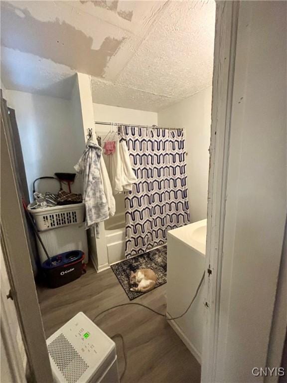 bathroom featuring vanity and wood-type flooring