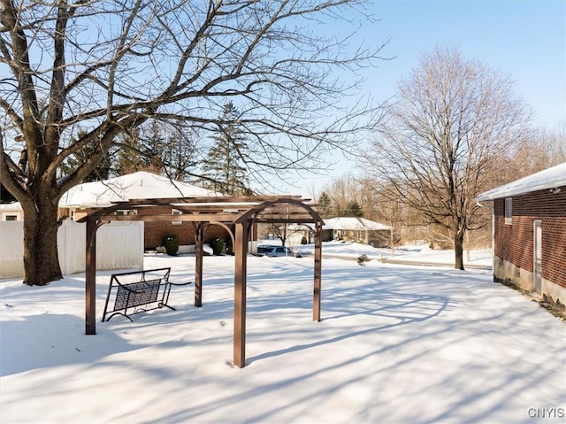 view of yard layered in snow