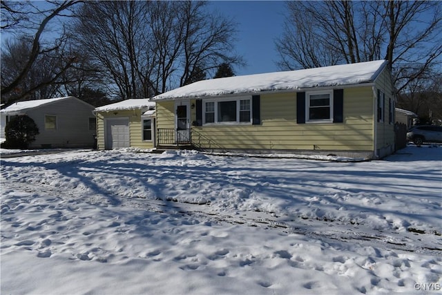 single story home featuring a garage