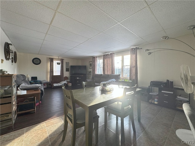 dining space featuring a paneled ceiling