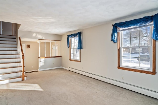 unfurnished living room with a baseboard radiator