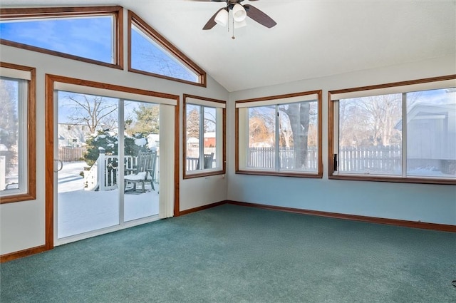 unfurnished sunroom with vaulted ceiling and ceiling fan