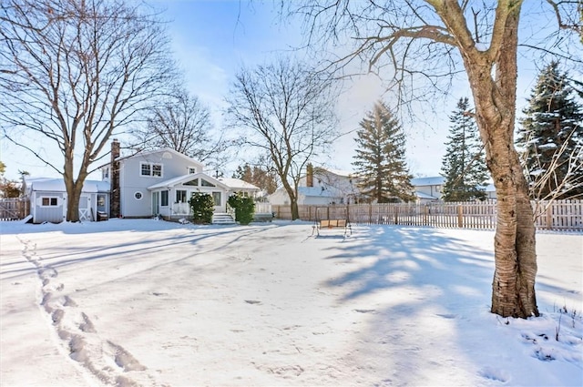 view of yard covered in snow