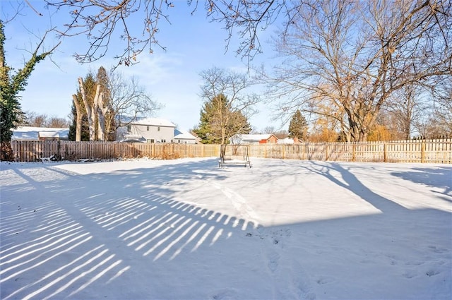 view of yard covered in snow