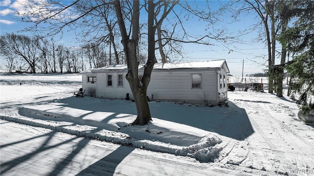 view of snow covered property