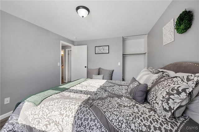 bedroom featuring hardwood / wood-style floors