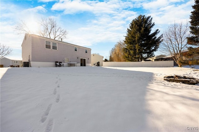 view of snow covered house