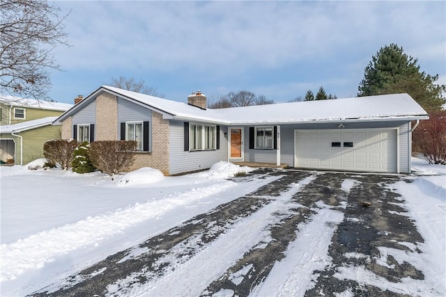 ranch-style house with a garage