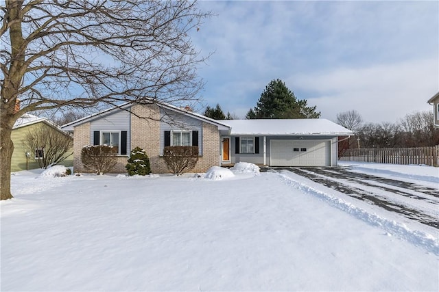 single story home with a garage