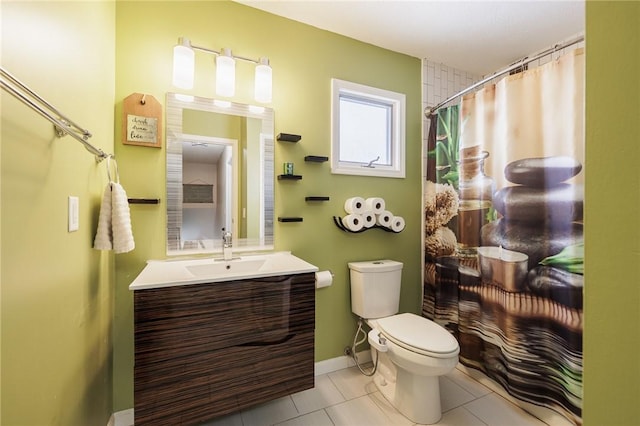 bathroom featuring a shower with curtain, toilet, tile patterned floors, and vanity