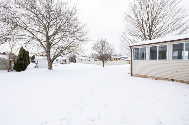 view of yard covered in snow