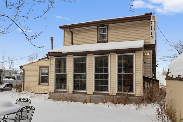 view of snow covered property