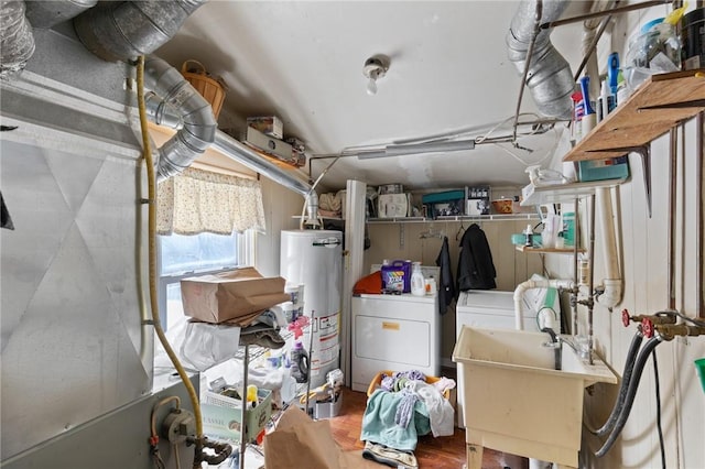 interior space with sink, washer / clothes dryer, and water heater