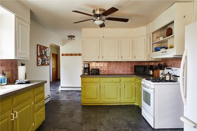 kitchen with a baseboard radiator, white appliances, decorative backsplash, and ceiling fan