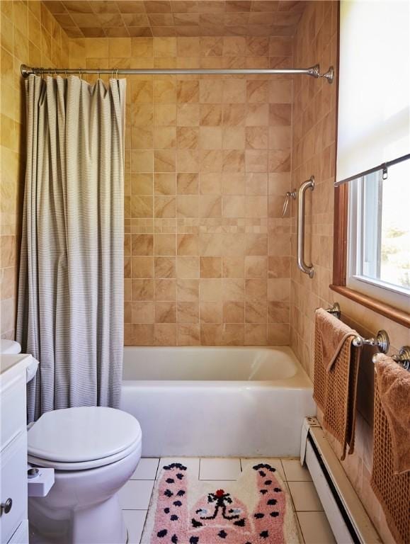 full bathroom with baseboard heating, shower / bath combo, tile patterned floors, toilet, and vanity