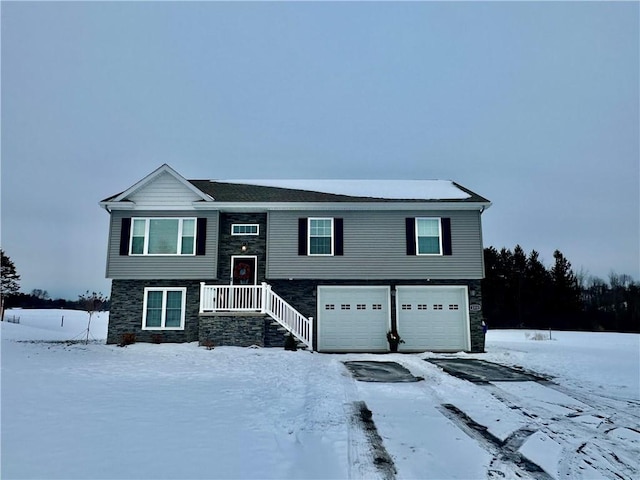 split foyer home featuring a garage