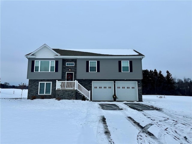 split foyer home featuring a garage